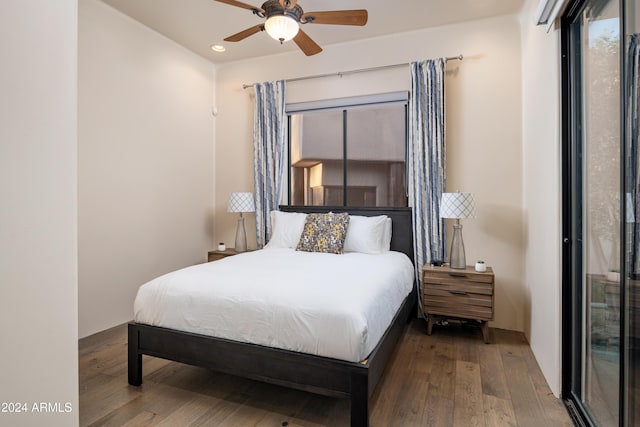 bedroom featuring ceiling fan and hardwood / wood-style floors