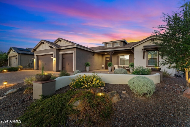 view of front of property with a garage