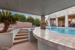 pool with a patio