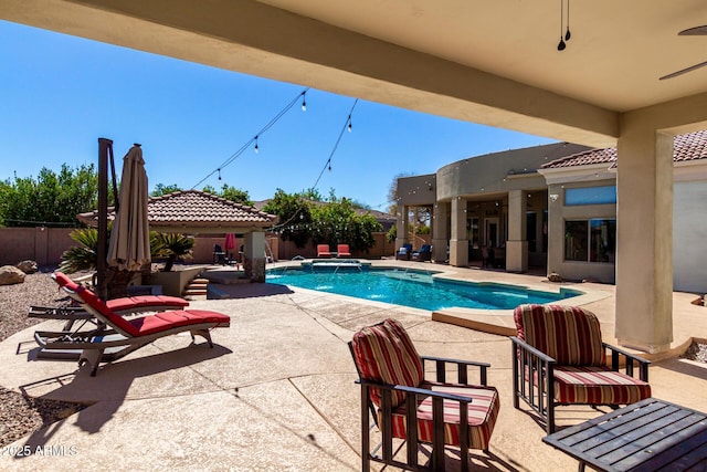 view of pool with a fenced backyard, a fenced in pool, and a patio