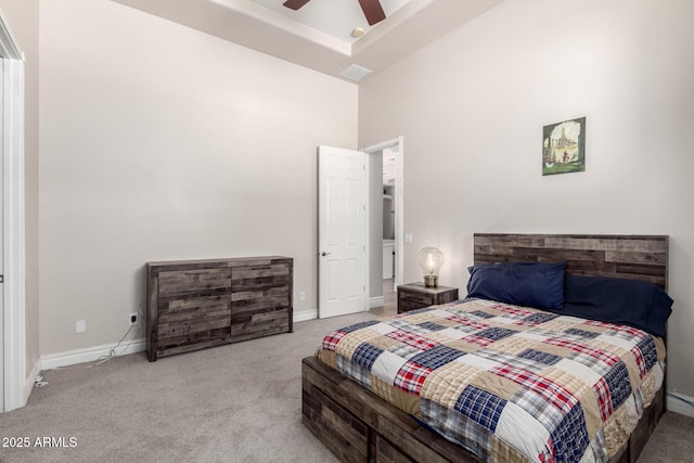 bedroom with carpet, ceiling fan, and baseboards