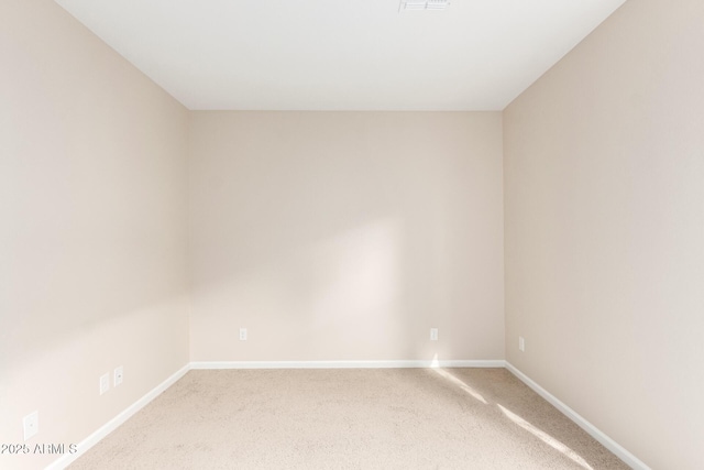 unfurnished room with carpet floors