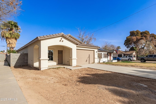 view of front of property featuring a garage