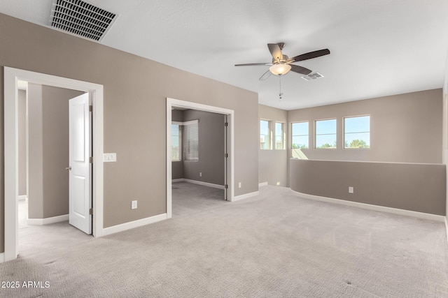 36145 N Desert Tea Dr, Queen Creek, AZ 85140 - unfurnished room featuring ceiling fan, light carpet, and baseboards