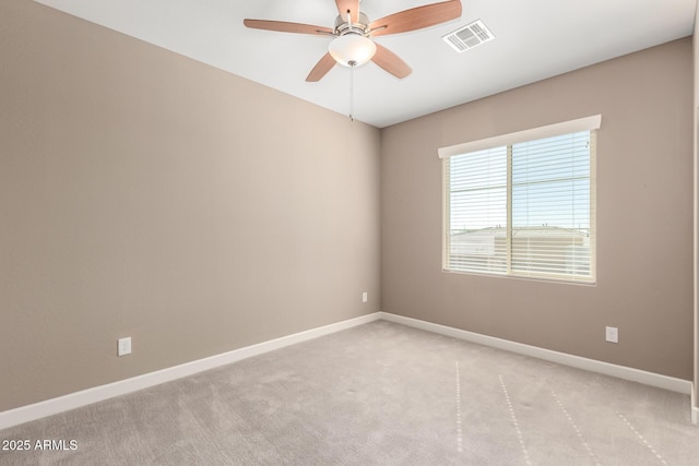 36145 N Desert Tea Dr, Queen Creek, AZ 85140 - spare room featuring a ceiling fan, baseboards, and light colored carpet