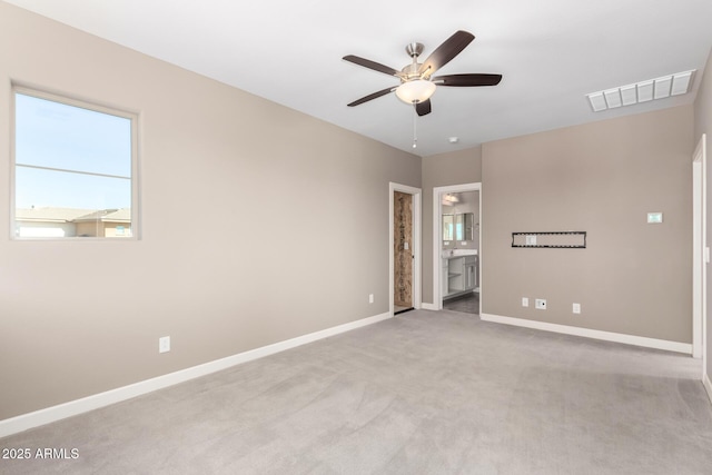 36145 N Desert Tea Dr, Queen Creek, AZ 85140 - unfurnished bedroom featuring carpet, baseboards, ensuite bath, and a ceiling fan