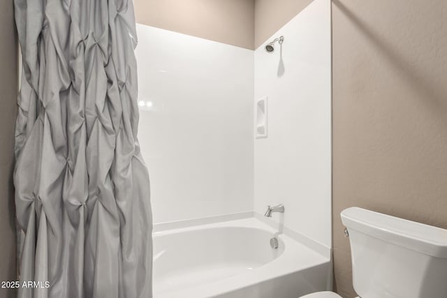 36145 N Desert Tea Dr, Queen Creek, AZ 85140 - bathroom featuring toilet and shower / bath combo with shower curtain