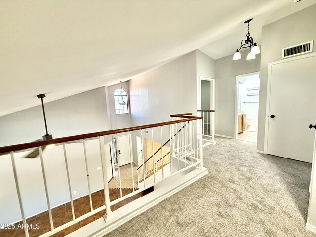 4028 E Mountain Sage Dr, Phoenix, AZ 85044 - hall with lofted ceiling, an upstairs landing, carpet flooring, and baseboards