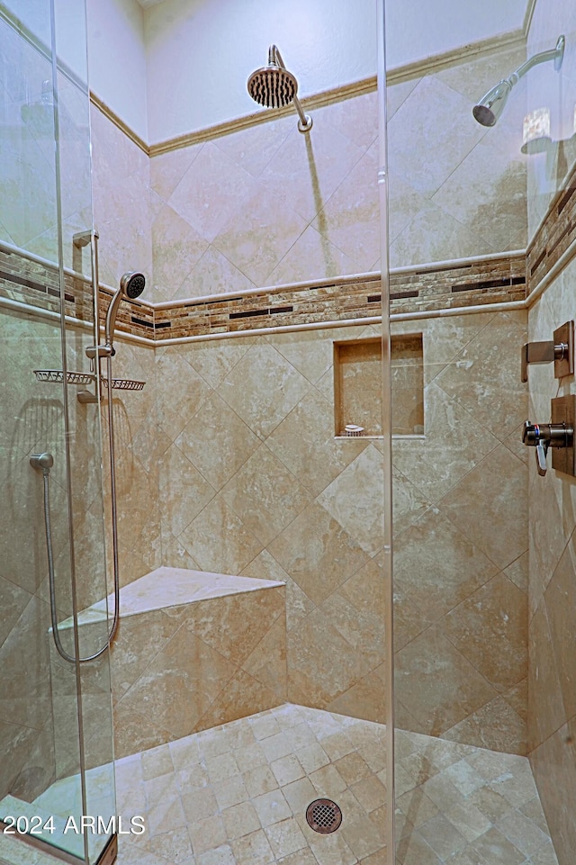 bathroom with an enclosed shower