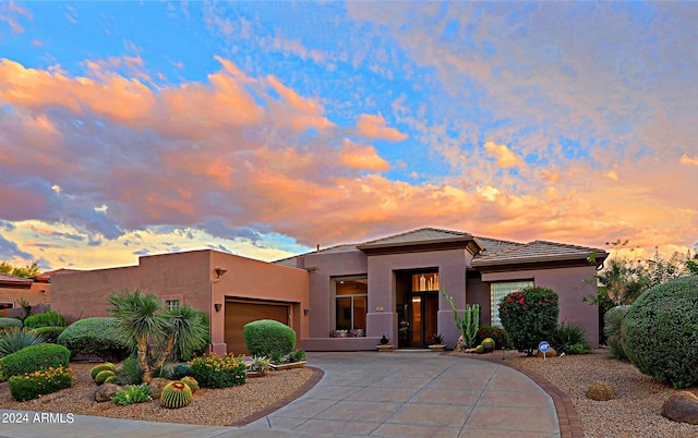 view of front of home with a garage