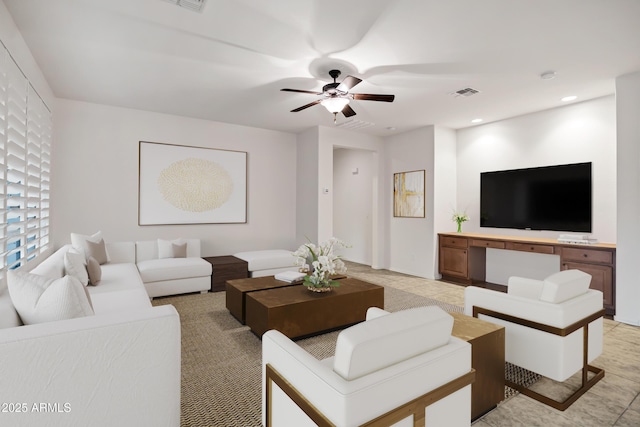 living room with recessed lighting, ceiling fan, and visible vents