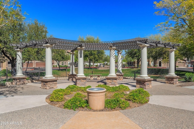 view of home's community with a pergola