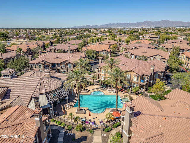 drone / aerial view with a mountain view and a residential view