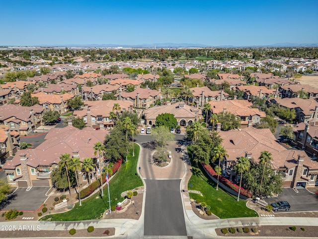 birds eye view of property with a residential view