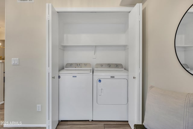 5808 E Brown Rd Unit 49, Mesa, AZ 85205 - washroom with independent washer and dryer and wood finished floors