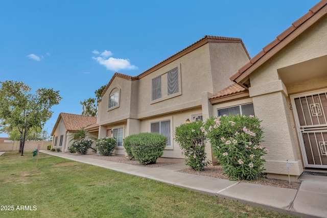 5808 E Brown Rd Unit 49, Mesa, AZ 85205 - view of front of home featuring a tile roof and stucco siding