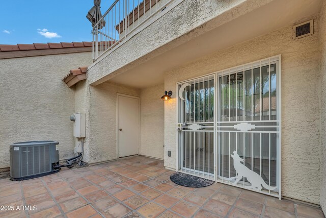 5808 E Brown Rd Unit 49, Mesa, AZ 85205 - view of patio featuring central air condition unit