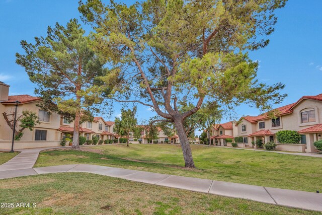 5808 E Brown Rd Unit 49, Mesa, AZ 85205 - view of home's community with a residential view and a lawn