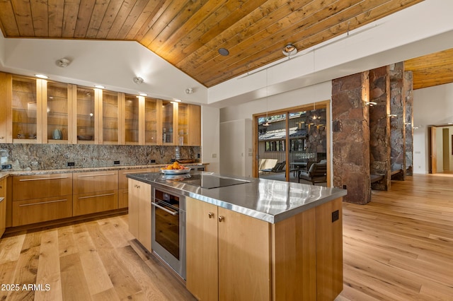 2096 William Palmer, Flagstaff, AZ 86005 - kitchen featuring black electric cooktop, wooden ceiling, stainless steel oven, and stainless steel countertops