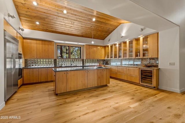 2096 William Palmer, Flagstaff, AZ 86005 - kitchen featuring wine cooler, wooden ceiling, a center island, and stainless steel appliances