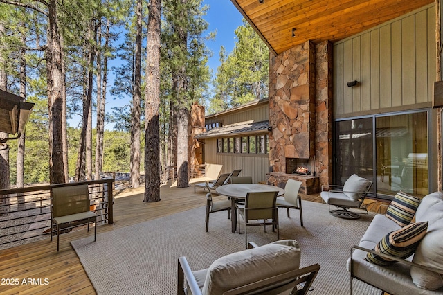 2096 William Palmer, Flagstaff, AZ 86005 - view of patio / terrace with an outdoor living space with a fireplace and a deck