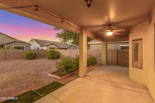 view of patio with ceiling fan and a fenced backyard