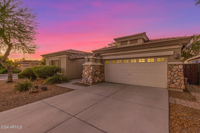 prairie-style home with a garage