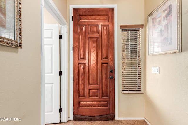 interior space with tile patterned floors