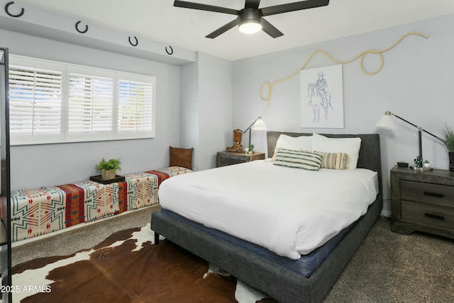 bedroom with carpet and a ceiling fan