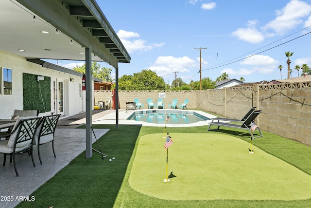 view of pool featuring a fenced in pool, a patio area, and a fenced backyard