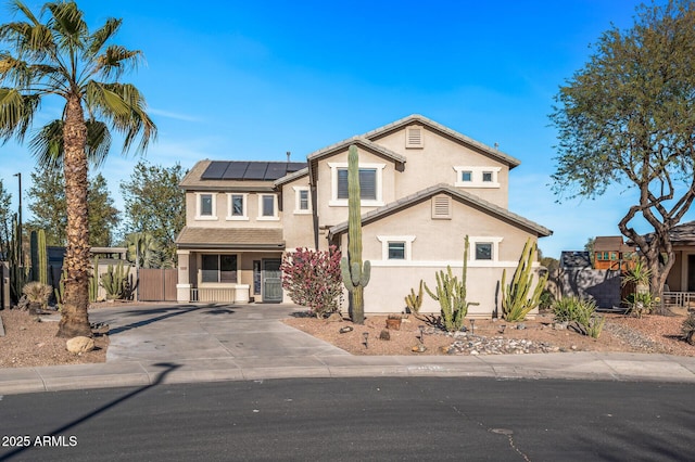 view of property with solar panels