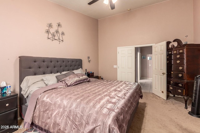 bedroom with ceiling fan and carpet