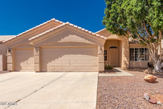 view of front of home with a garage