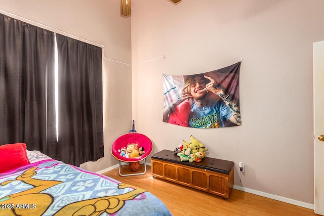 bedroom featuring hardwood / wood-style floors