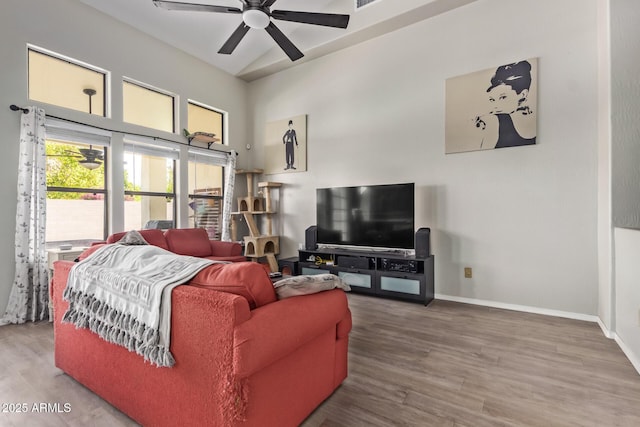 5428 W Wethersfield Dr, Glendale, AZ 85304 - living area featuring baseboards, a high ceiling, wood finished floors, and ceiling fan
