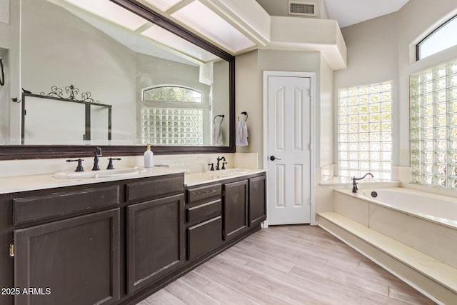5428 W Wethersfield Dr, Glendale, AZ 85304 - full bathroom featuring plenty of natural light, visible vents, and a sink