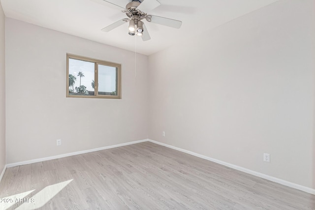 spare room featuring ceiling fan and light hardwood / wood-style floors