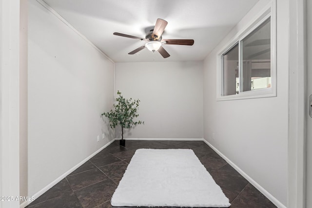 spare room with ceiling fan