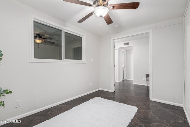 empty room with ceiling fan