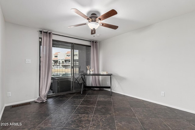 unfurnished room featuring ceiling fan