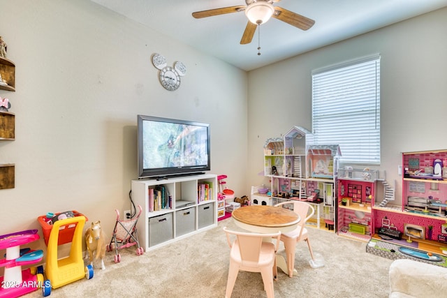 game room featuring carpet floors and ceiling fan