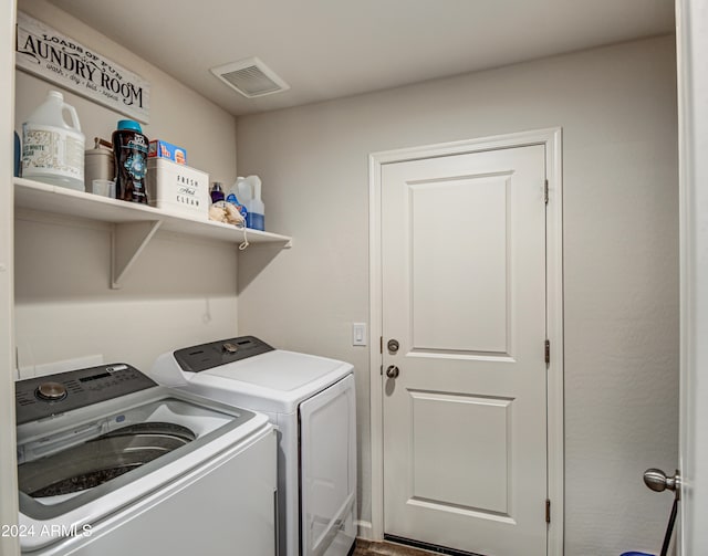 laundry room featuring washer and dryer