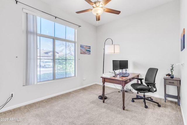 office space with carpet flooring and ceiling fan