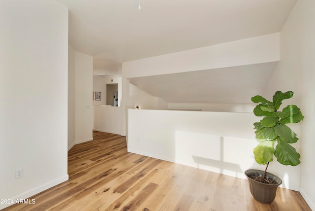 corridor featuring light wood-type flooring