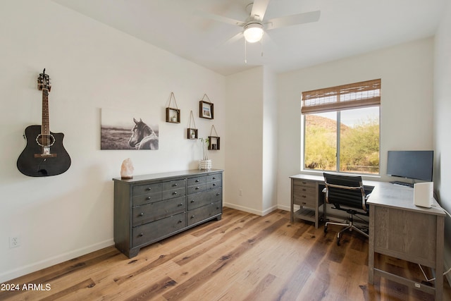 office area with ceiling fan and light hardwood / wood-style flooring