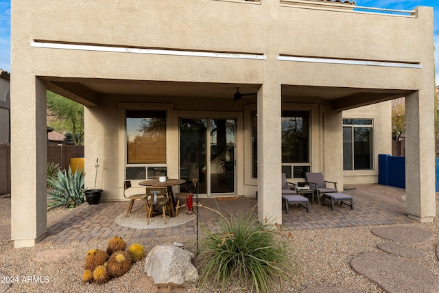 view of patio / terrace featuring ceiling fan