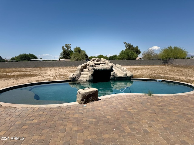 view of pool featuring a patio