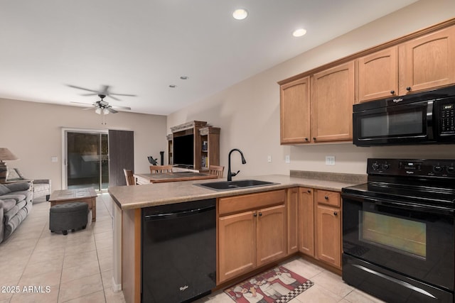 kitchen featuring black appliances, light tile patterned floors, sink, kitchen peninsula, and ceiling fan