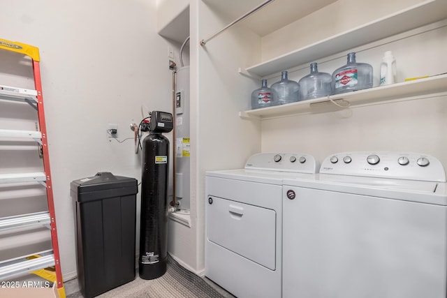 clothes washing area featuring separate washer and dryer