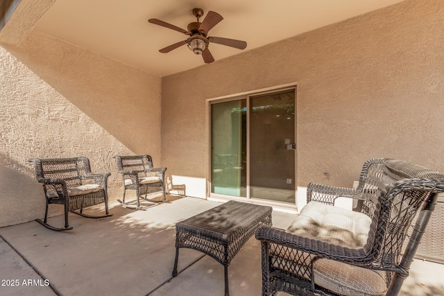 view of patio / terrace featuring ceiling fan and an outdoor hangout area